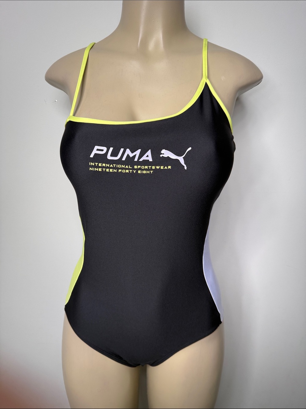 Puma Black bodysuit with Neon Yellow Trim